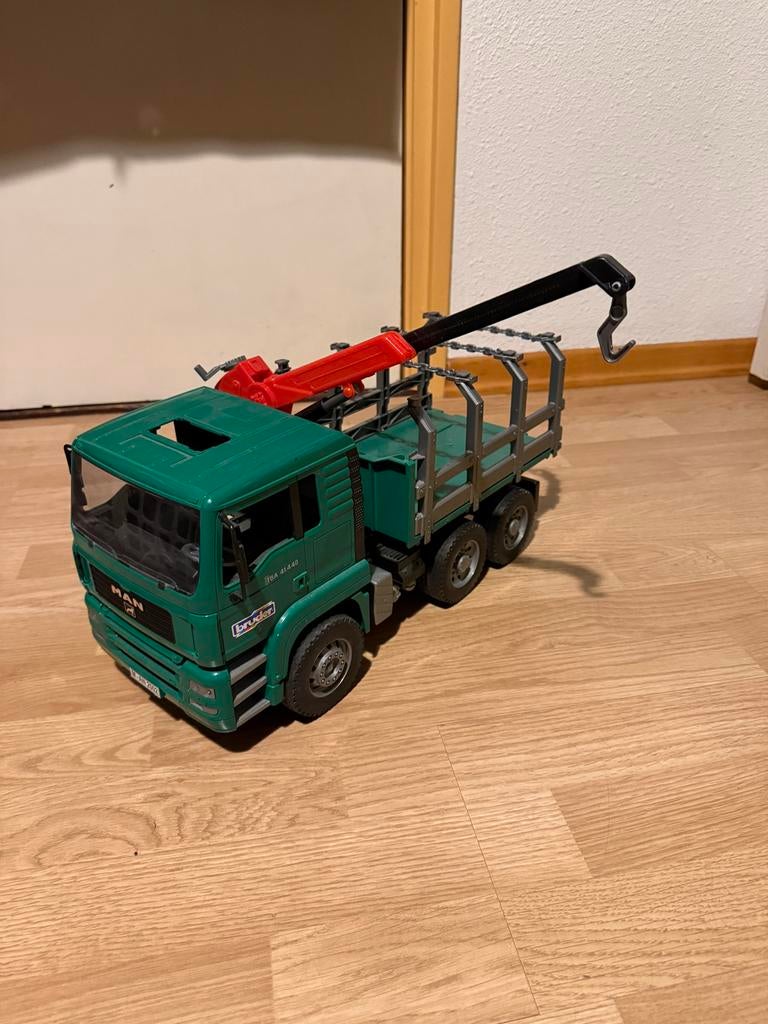 Bruder MAN boomstamwagen met rubberen banden, Ophalen of Verzenden, Gebruikt