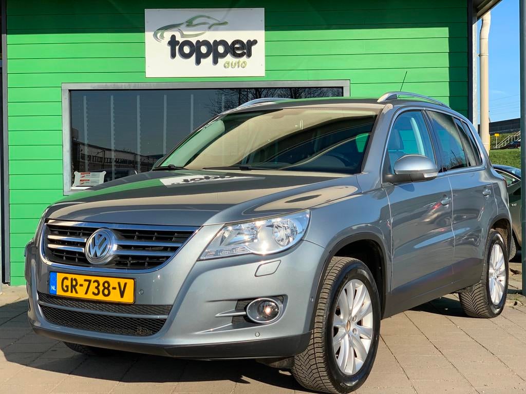 Volkswagen Tiguan 1.4 TSI Sport&Style|Navi|StoelVw.|CruiseCo, Auto's, Volkswagen, Voorwielaandrijving, Euro 5, 15 km/l, Bluetooth