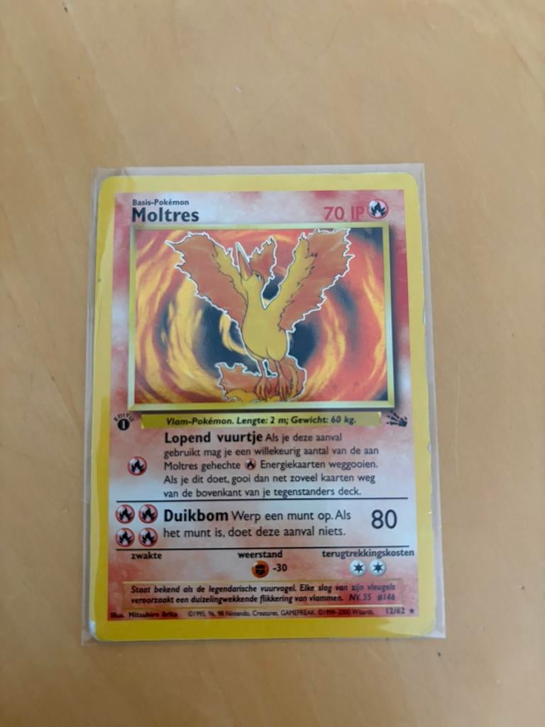 Moltres fossil 1st edition NL, Hobby en Vrije tijd, Verzamelkaartspellen | Pokémon, Ophalen of Verzenden, Zo goed als nieuw