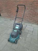 Gebruikte grasmaaier, Ophalen, Gebruikt