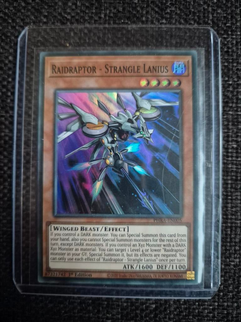 Yu-Gi-Oh! Raidraptor - Strangle Lanius PFLA-EN005, Ophalen of Verzenden, Zo goed als nieuw, Losse kaart, Foil