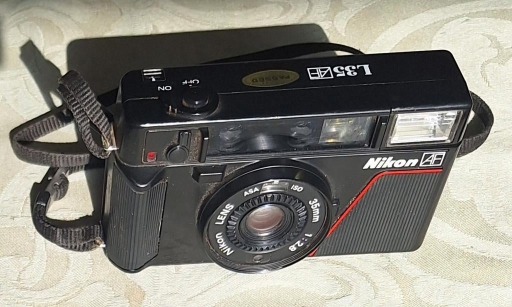 Camera Nikon L35 AF Nikon lens 1:2.8, Audio, Tv en Foto, Fotocamera's Analoog, Ophalen of Verzenden, Spiegelreflex, Nikon