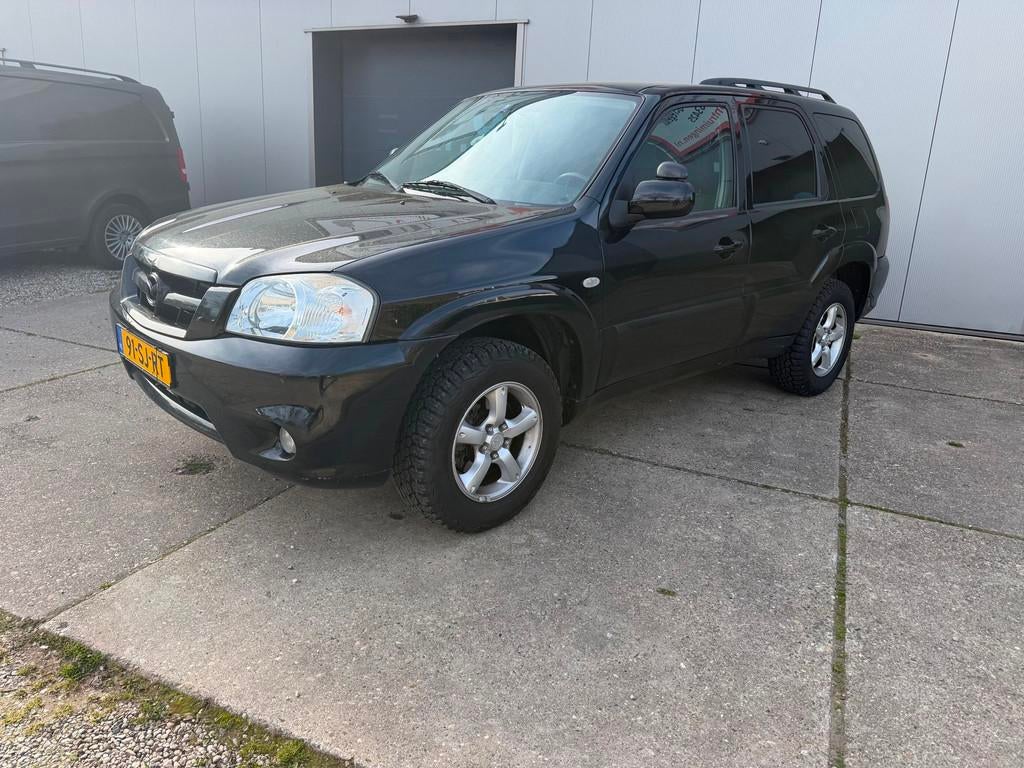 Mazda Tribute 2.3i Touring 4x4 met terrein banden, Auto's, Mazda, Gebruikt, 680 kg, 4 cilinders, 150 pk