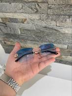 Blauwe zonnebril met goudkleurige frame zeer luxe, Overige merken, Zonnebril, Blauw, Nieuw