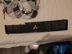 Mitsubishi Colt 1984-1988grill, Gebruikt, Ophalen of Verzenden, Links, Mitsubishi