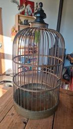 Koperen antieke vogelkooi, Ophalen