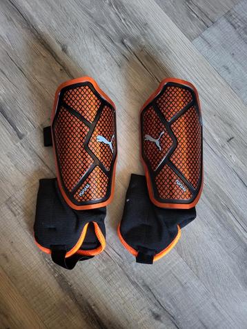 Puma FUTURE Scheenbeschermers - Oranje/Zwart beschikbaar voor biedingen