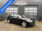 BMW 1-serie 116i High Executive Sport, Auto's, Gebruikt, 4 cilinders, Zwart, Leder