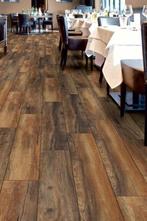 Mooie partij 24 cm brede bruin laminaat te koop 65m2, Nieuw, Ophalen of Verzenden, Bruin, 75 m² of meer