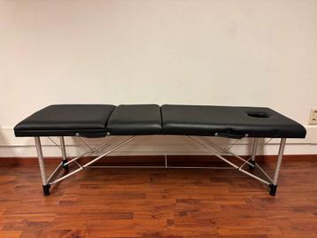 Inklapbare massagetafel – praktisch en in goede staat beschikbaar voor biedingen