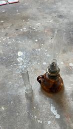 Olielamp met reserveglas, Ophalen