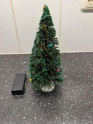 Kerstboompje op batterij beschikbaar voor biedingen