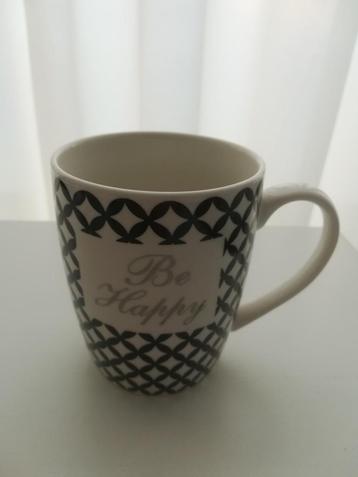 "Be Happy" mok beschikbaar voor biedingen