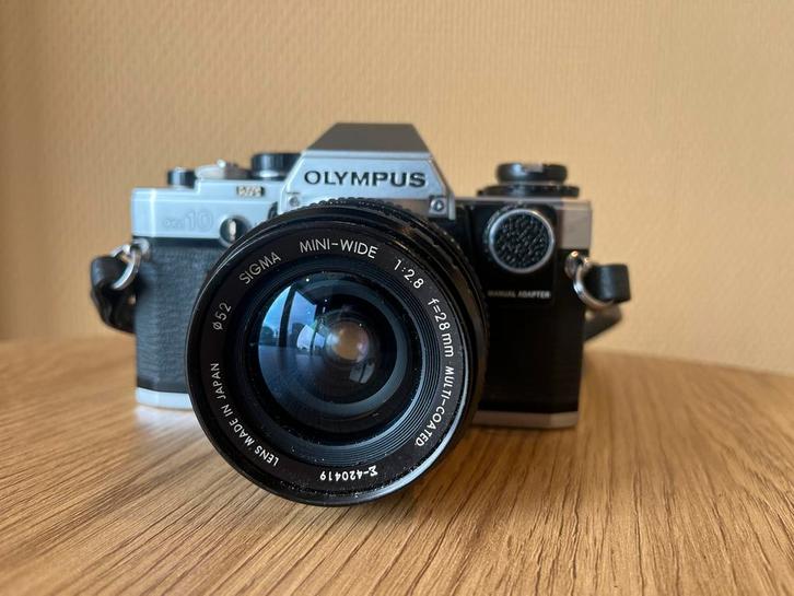 Olympus OM10 + sigma 28mm f2.8 lens (Getest), Audio, Tv en Foto, Fotocamera's Analoog, Gebruikt, Spiegelreflex, Olympus, Ophalen of Verzenden