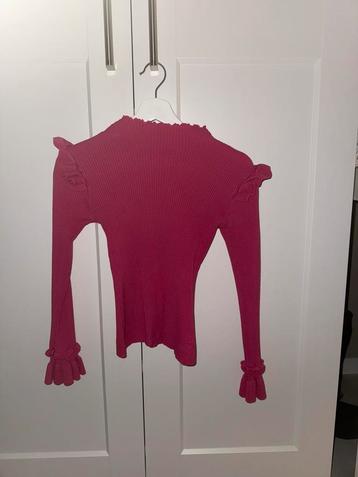Roze trui beschikbaar voor biedingen