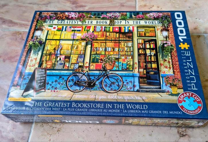 Puzzel 1000 stukjes The Greatest Bookstore In The World, Hobby en Vrije tijd, Gezelschapsspellen | Overige, Nieuw, Ophalen of Verzenden