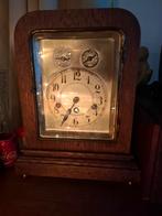 Antieke Engelse klok met klokkenspel, Ophalen