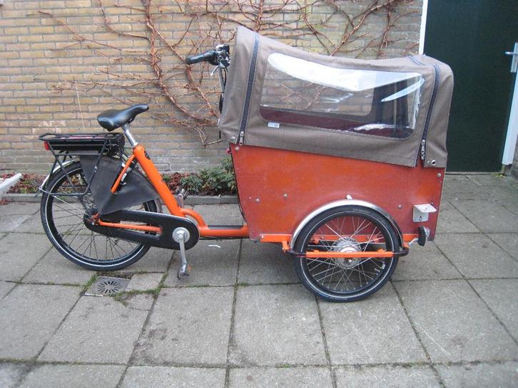 Oersterke vrolijke oranje elektrische bakfiets, Fietsen en Brommers, Fietsen | Bakfietsen, Gebruikt, Overige merken, 4 kinderen of meer