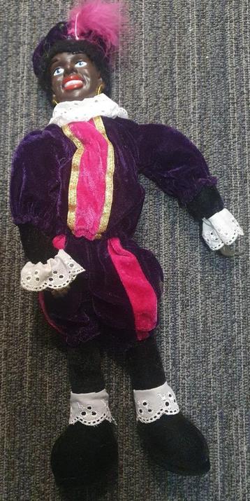 Oude zwarte piet van 45 cm lang beschikbaar voor biedingen