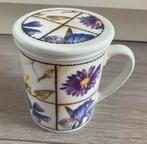 Mok/ beker met theezeef bloemen motief, Huis en Inrichting, Keuken | Servies, Ophalen of Verzenden, Gebruikt, Overige stijlen