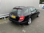 Mercedes-Benz C-Klasse Estate 180 Business Class Clima, Navi, Auto's, Euro 5, 1796 cc, Zwart, Handgeschakeld
