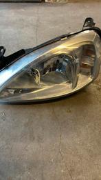 Opel corsa koplamp 2006, Opel, Gebruikt, Ophalen of Verzenden