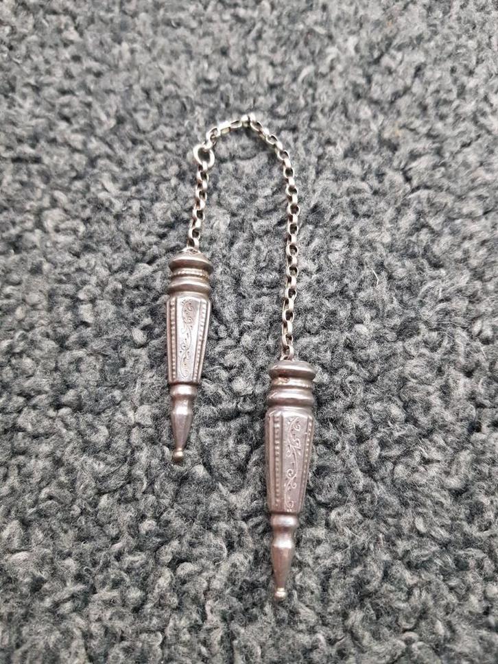 Antieke zilveren breidoppen aan jasseron., Antiek en Kunst, Antiek | Goud en Zilver, Ophalen of Verzenden