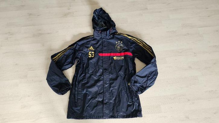 Ajax Regenjas! Seizoen 13/14! Sponsor! Mt 7 (M/L)!, Kleding | Heren, Sportkleding, Zo goed als nieuw, Voetbal, Blauw, Ophalen of Verzenden