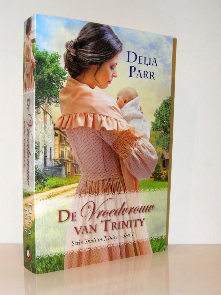 Delia Parr - De vroedvrouw van Trinity (christelijke roman), Ophalen of Verzenden, Zo goed als nieuw
