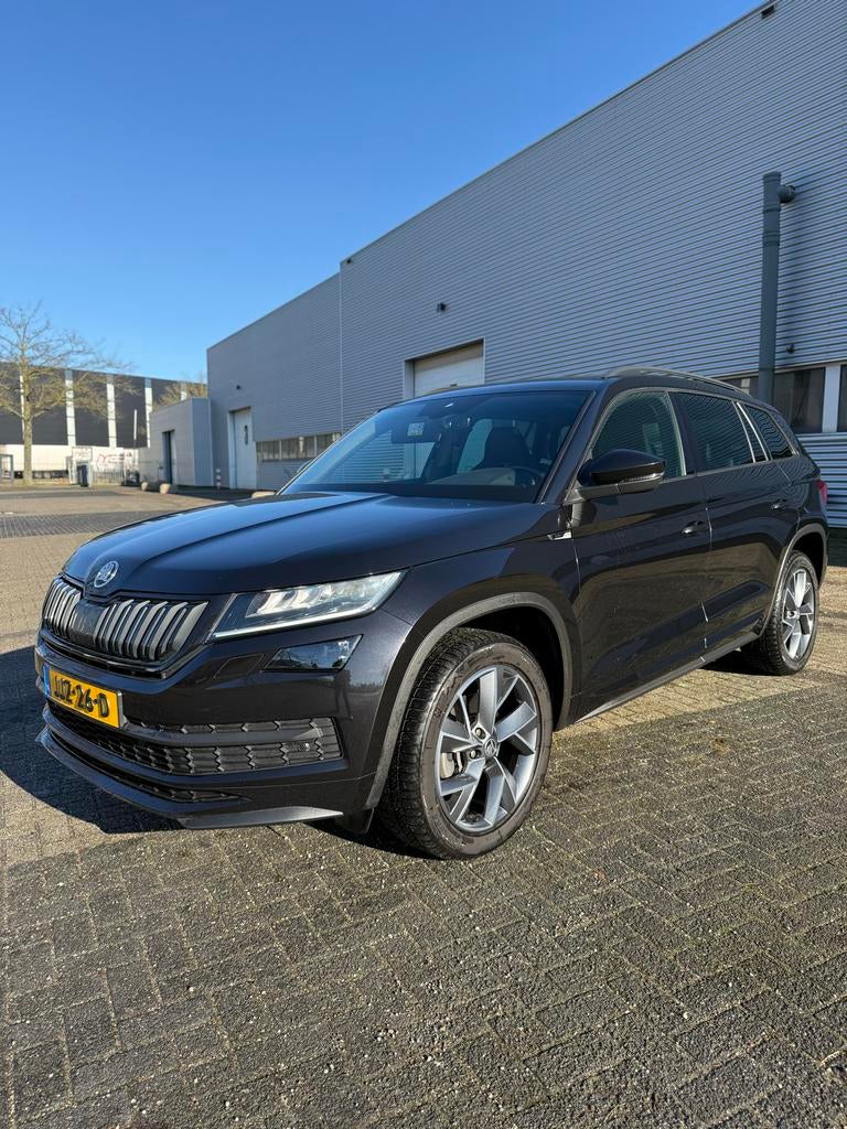 Skoda Kodiaq 1.5 TSI Sport Line 150pk Dsg-7 7pl. 2020, Auto's, Skoda, Zwart, 4 cilinders, 7 stoelen, Zwart