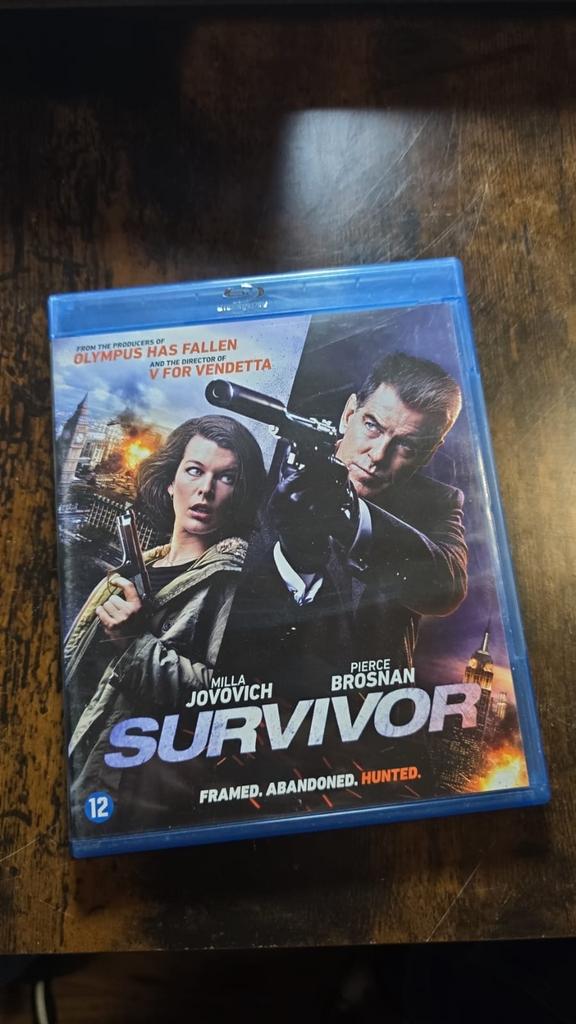 Survivor Blu-ray met Milla Jovovich en Pierce Brosnan, Cd's en Dvd's, Blu-ray, Ophalen of Verzenden, Zo goed als nieuw