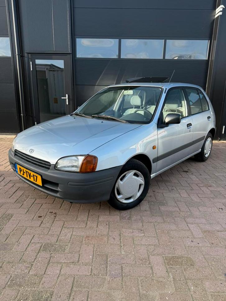 Toyota Starlet 1.3 16V 55KW 1996 Grijs Kanteldak 1e Eigenaar, Auto's, Toyota, Bedrijf, Starlet, Airbags, Metallic lak, Mistlampen