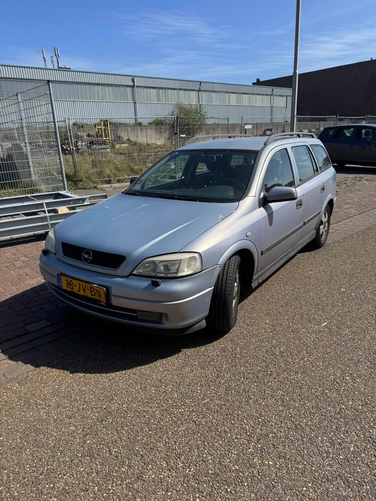Opel Astra 1.8 16V St.wgn. AUT 2002 Grijs, Auto's, 125 pk, 1796 cc, 630 kg, Particulier