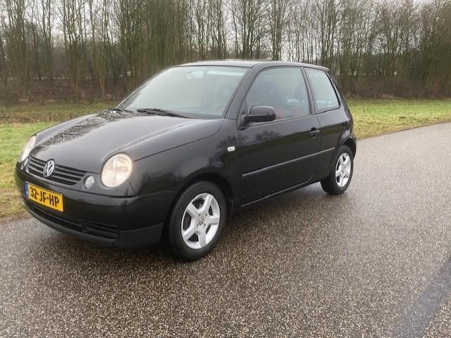 Volkswagen Lupo 1.4 44KW 2002 Zwart, Auto's, Volkswagen, Voorwielaandrijving, 4 cilinders, 4 stoelen, Zwart