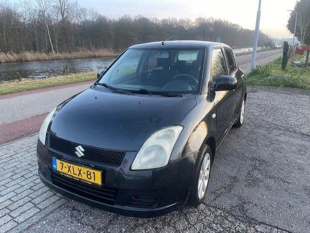 Suzuki Swift LPG/BENZINE 2007 Zwart, Voorwielaandrijving, 40 €/maand, 965 kg, 400 kg