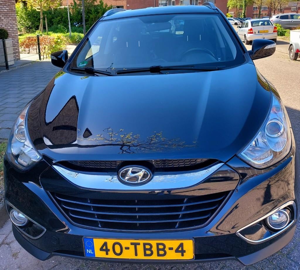 Hyundai iX35 2.0 I Cvvt 2WD AUT 2012 Zwart, Auto's, Hyundai, Zwart, 4 cilinders, Leder en Stof, Origineel Nederlands