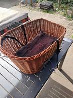 Hondenmand voor achterop de fiets, Ophalen