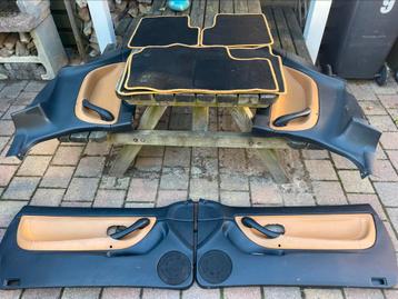 Twee handbediende interieurs voor Peugeot 406 Coupe beschikbaar voor biedingen