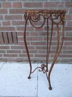 Gietijzeren plantentafel., Ophalen
