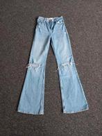 Bershka,  ripped jeans, flare/ flared, maat 32, Blauw, Zo goed als nieuw, W27 (confectie 34) of kleiner, Bershka