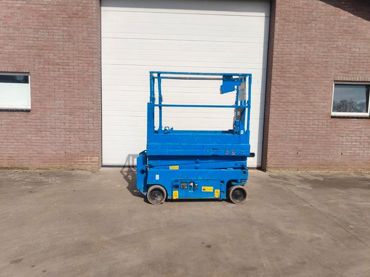Genie GS-1532 schaarlift hoogwerker, Zakelijke goederen, Machines en Bouw | Liften, Steigers en Ladders, Ophalen of Verzenden