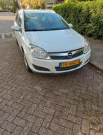 Opel Astra 1.6 16V 85KW St.wgn. 2009 wit, Auto's, Voorwielaandrijving, 657 kg, Zwart, 4 cilinders