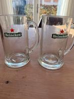 2 nog erg goede Heineken Bierpullen van 0,5 liter, Glas of Glazen, Gebruikt, Ophalen of Verzenden, Glas