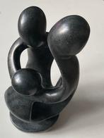 Spekstenen beeldje van een gezin, Ophalen