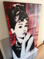 Audrey Hepburn canvas, Ophalen