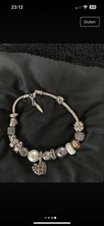 Zilveren bedelarmband 17 bedels 21 cm lang, Ophalen of Verzenden, Zo goed als nieuw, Met bedels of kralen, Zilver