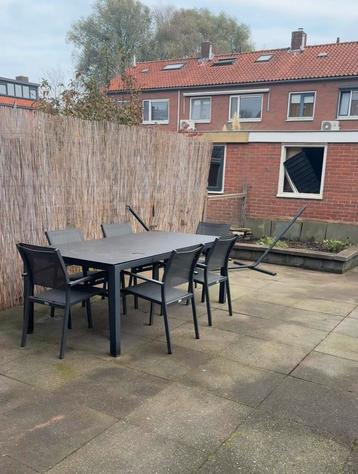 Tuintafel met 8 stoelen  beschikbaar voor biedingen