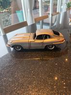 verzamelobject Jaguar E-Type Coupe 1961 schaal 1:18., Hobby en Vrije tijd, Modelauto's | 1:18, Ophalen of Verzenden, Gebruikt