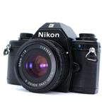 Nikon EM + Nikkor E-Series 50mm/1.8 Ai-s 'pancake', Audio, Tv en Foto, Fotocamera's Analoog, Ophalen of Verzenden, Zo goed als nieuw