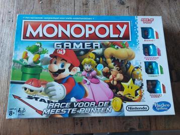 Monopoly spel super mario editie met 2 extra poppetjes!  beschikbaar voor biedingen